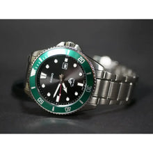 Reloj Casio Análogo Acero Inox Mdv-106dd-1a3vcf Correa Plateado Bisel Verde Oscuro Fondo Negro Casio